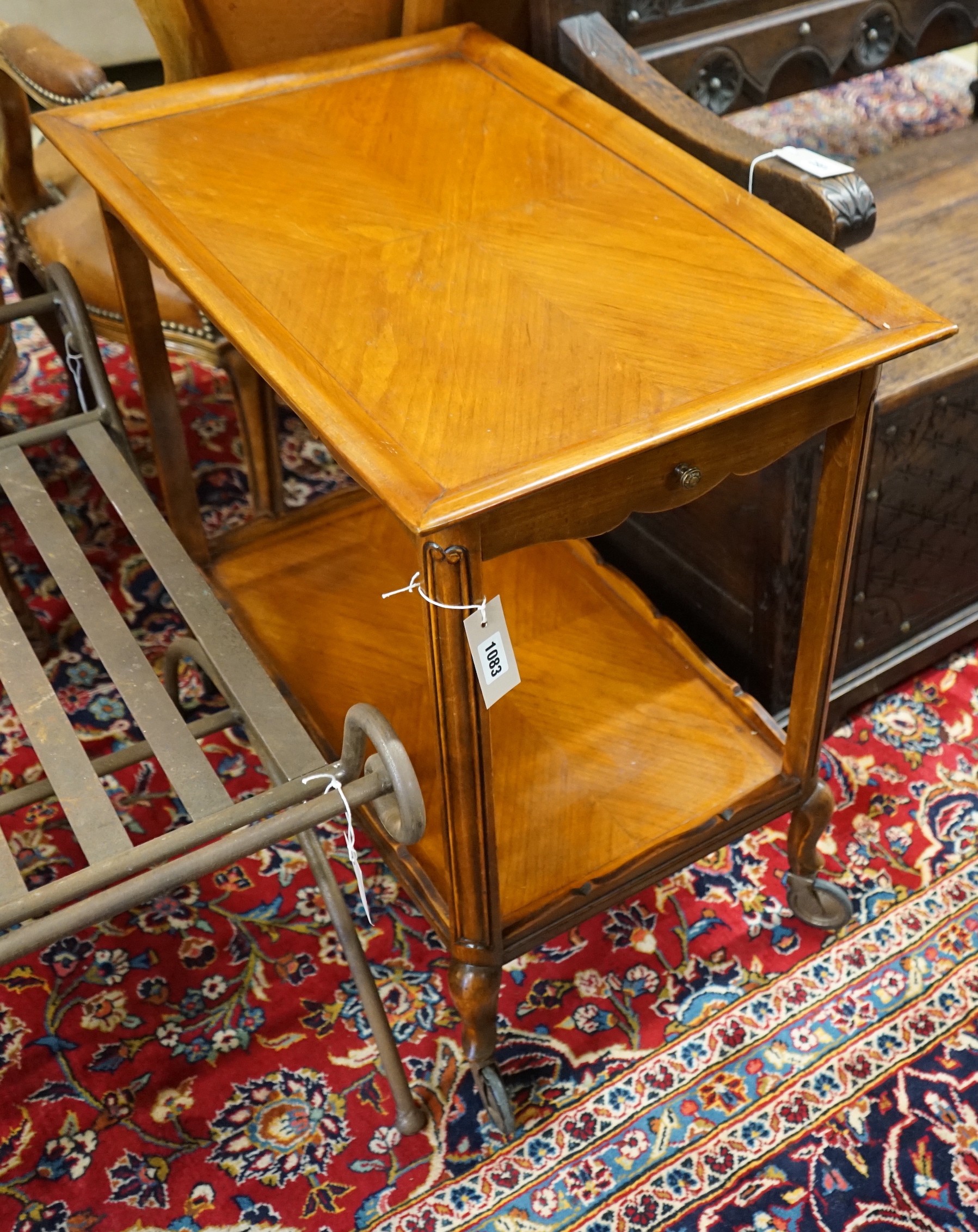A French reproduction rectangular two tier tea trolley, width 69cm, depth 44cm, height 69cm together with a G Plan teak coffee table